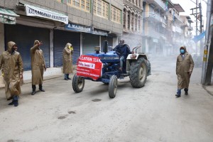 Srinagar: A team of the Srinagar Municipal Corporation carries out sanitisation drive at Srinagar's Saria Bala during the 21-day nationwide lockdown (that entered the 13th day) imposed as a precautionary measure to contain the spread of coronavirus, on Apr 6, 2020. (Photo: IANS)